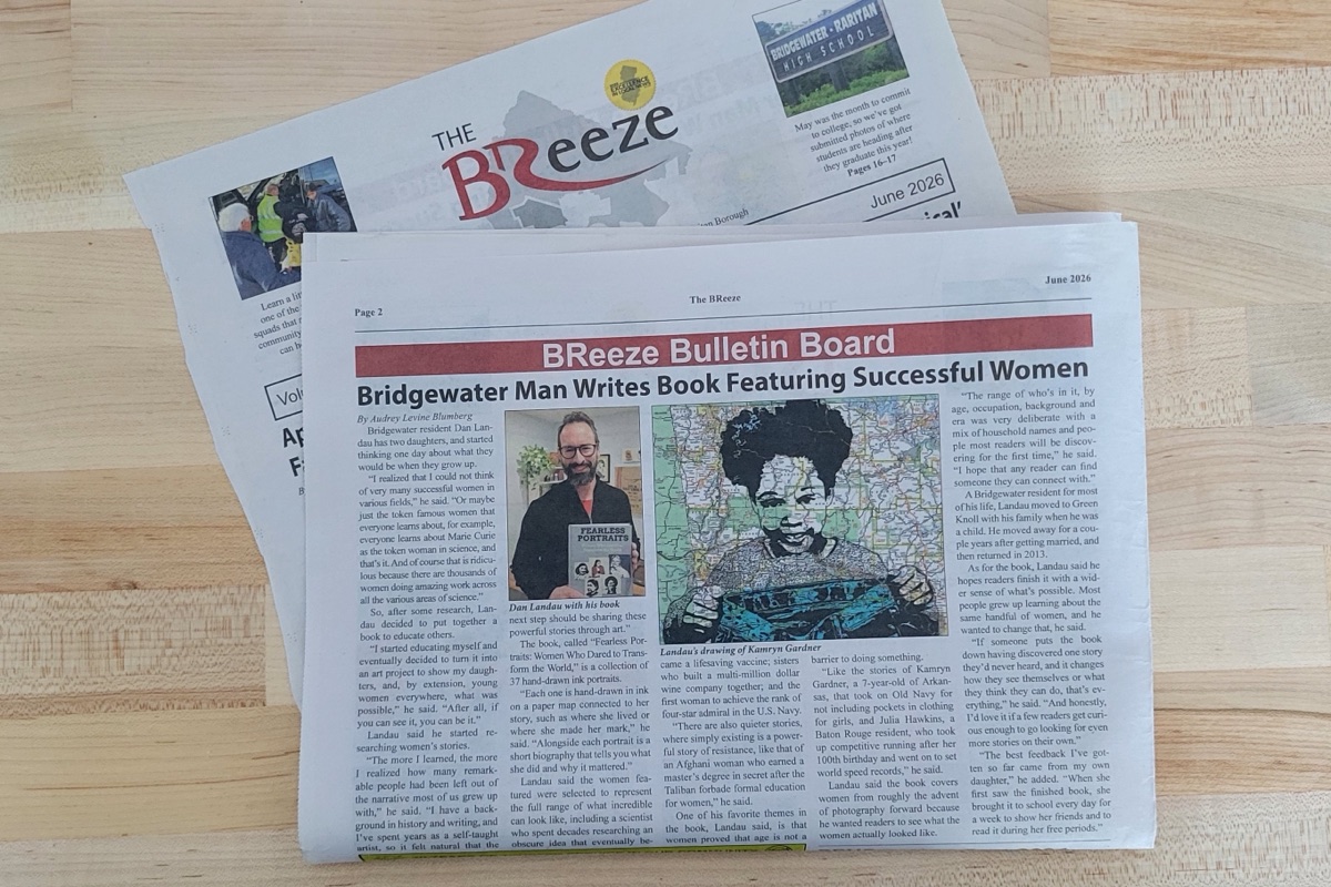 Newspaper article headlined Bridgewater Man Writes Book Featuring Successful Women, next to a cup of coffee
